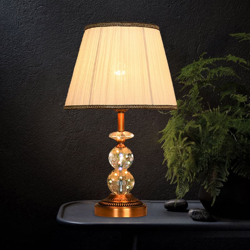 KristalGlow - Table lamp with tapered shape and facet-cut crystal balls