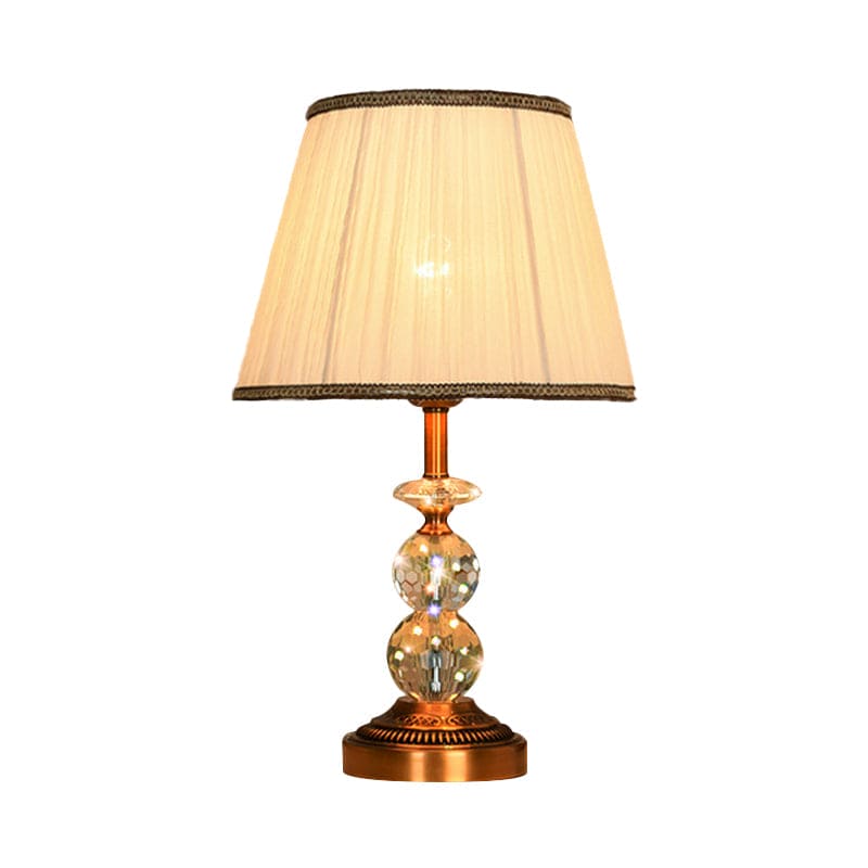 KristalGlow - Table lamp with tapered shape and facet-cut crystal balls