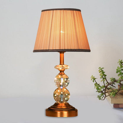 KristalGlow - Table lamp with tapered shape and facet-cut crystal balls