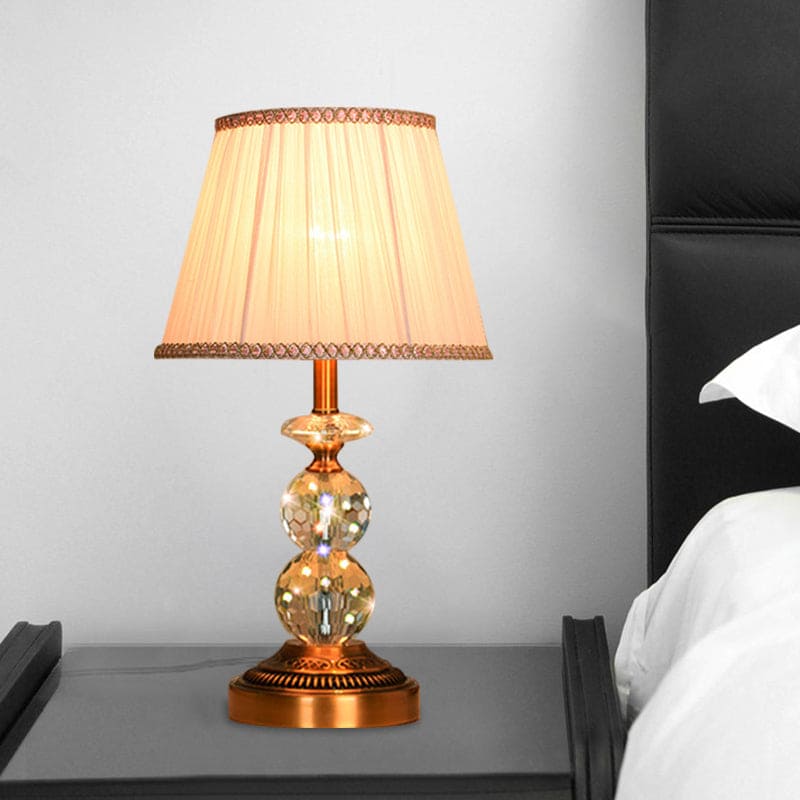 KristalGlow - Table lamp with tapered shape and facet-cut crystal balls