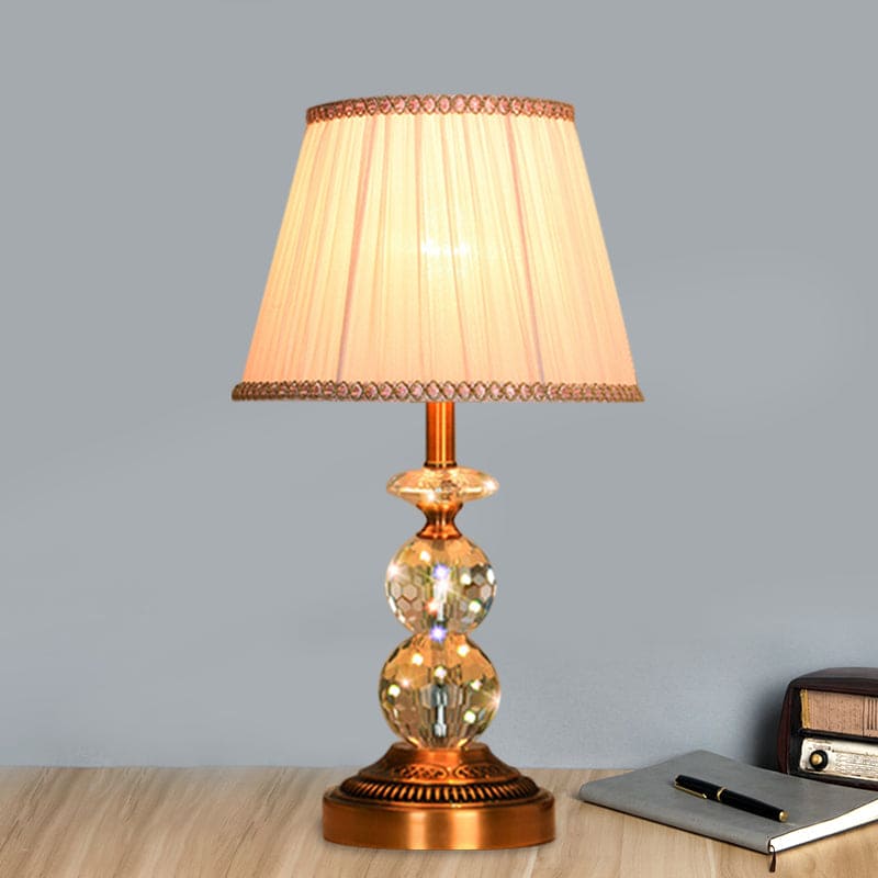 KristalGlow - Table lamp with tapered shape and facet-cut crystal balls