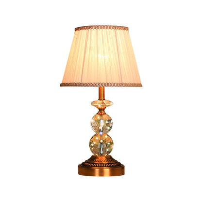 KristalGlow - Table lamp with tapered shape and facet-cut crystal balls