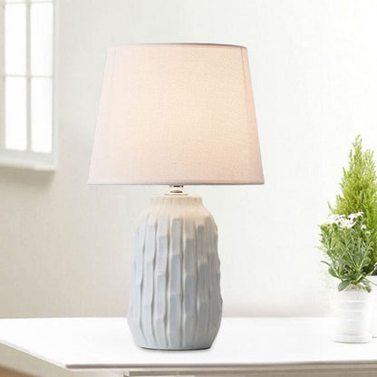 Eclat - Design table lamp with tapered shade and cylindrical ceramic base